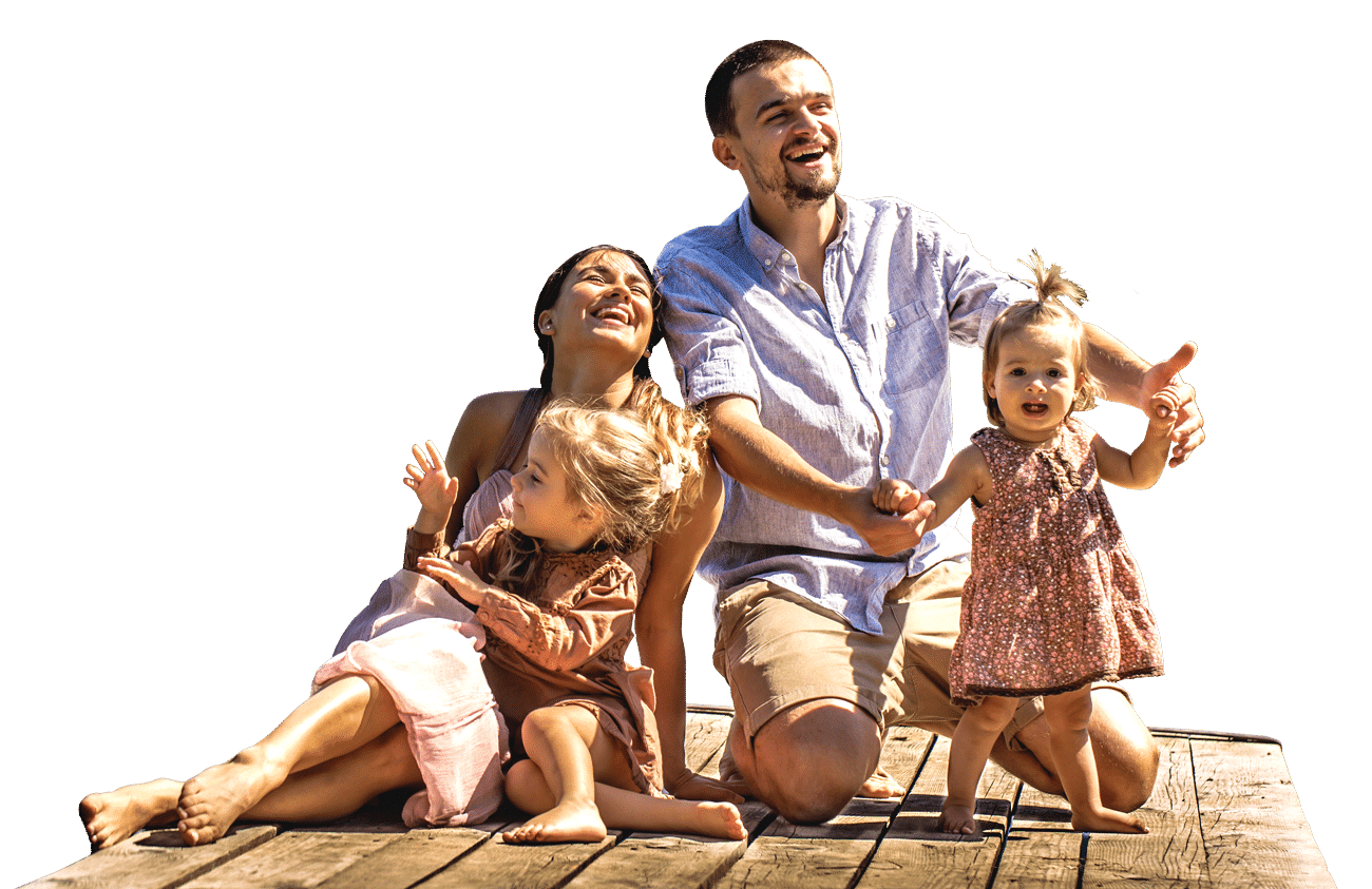 Parents with two young daughters sitting on dock by lake; cooling services.