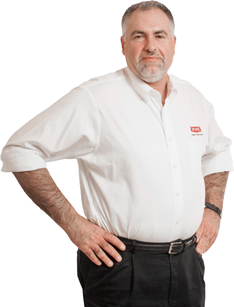 Owner of Hoffman Heating and Cooling, Greg, in Bryant logo shirt.